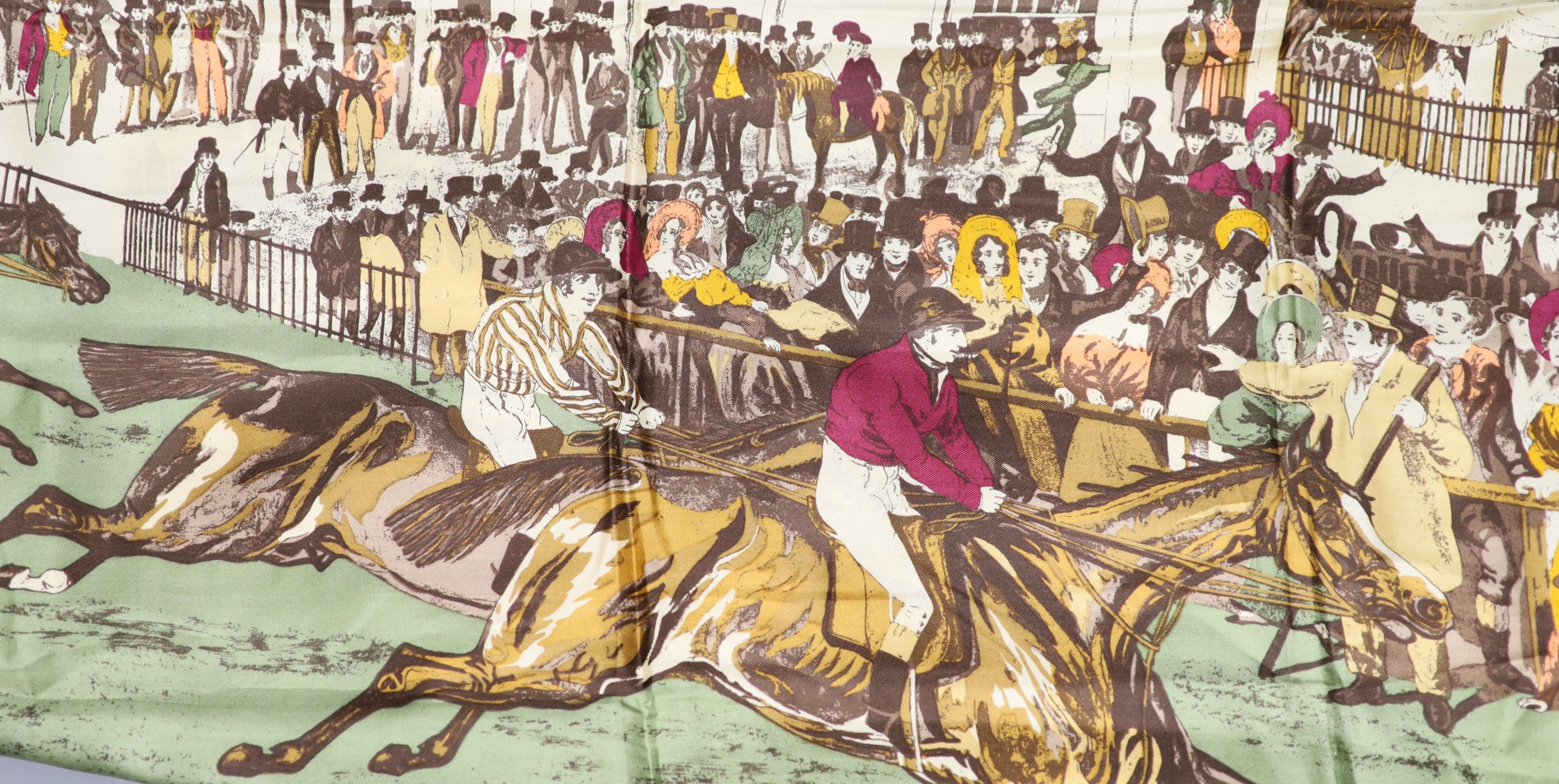 A Liberty silk scarf with a printed horse racing scene, with slip case